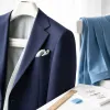 The tailored-relaxed suit: why 2026's fuller cut works harder than the skinny ever did