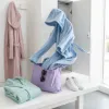 The modern men’s bath robe with hood: from spa luxury to street leisure
